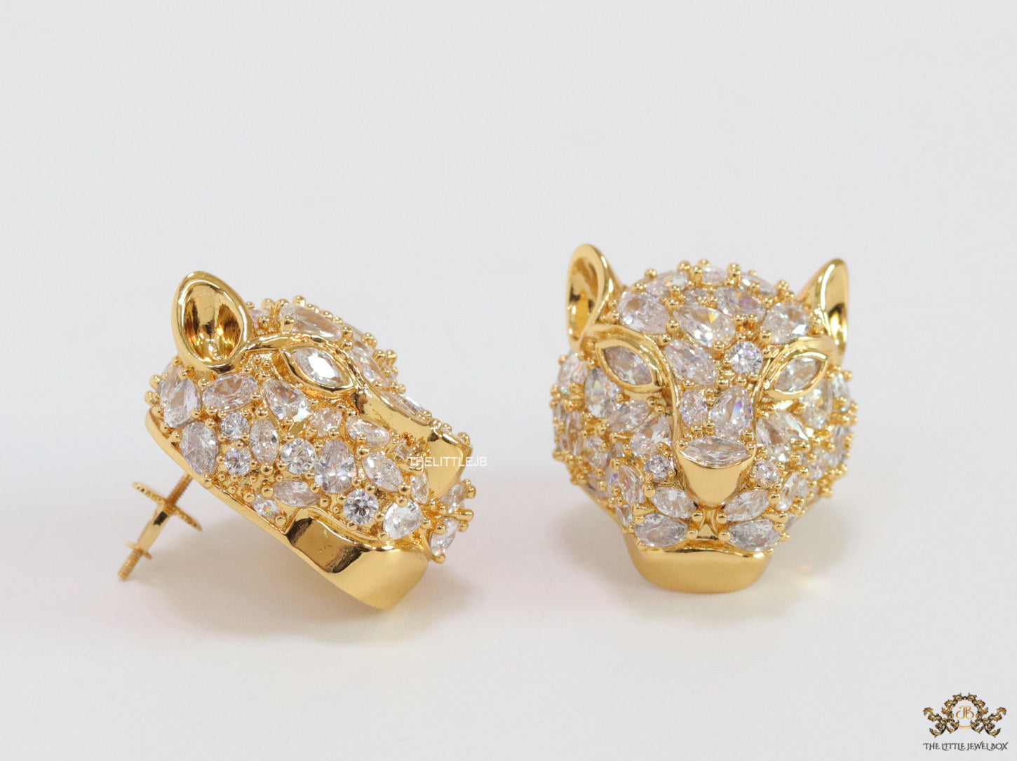 Panther head stud earrings in gold plating and cz