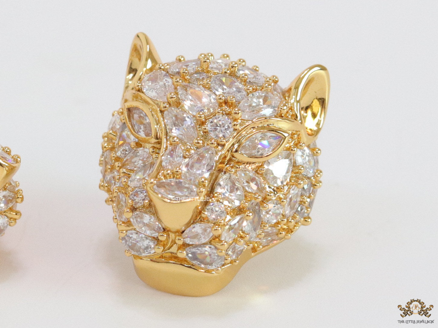 Panther head stud earrings in gold plating and cz