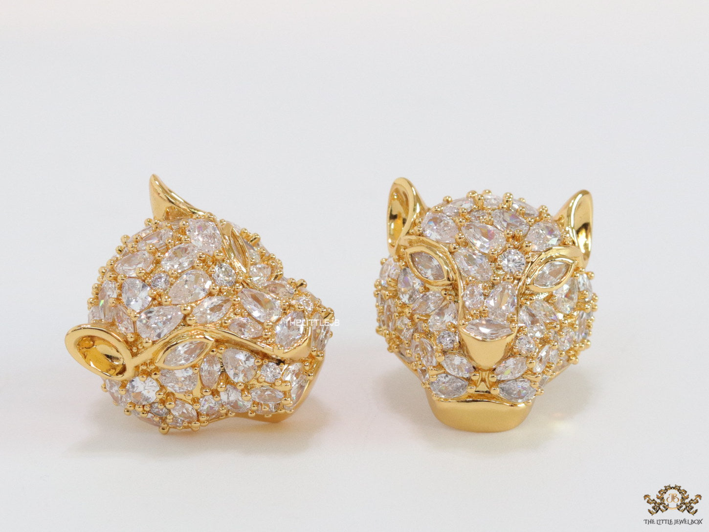 Panther head stud earrings in gold plating and cz