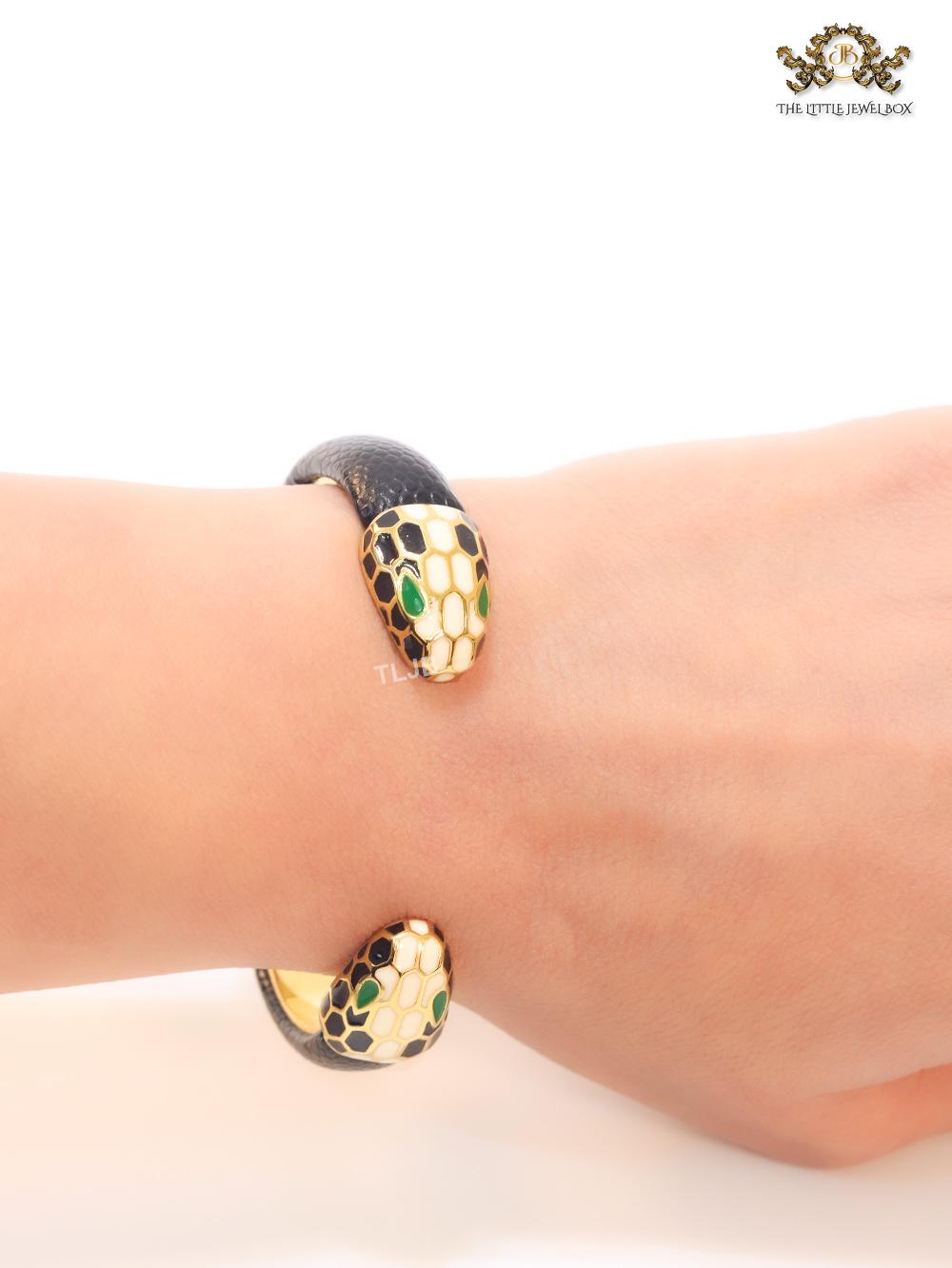 Two snake head black leather bracelet
