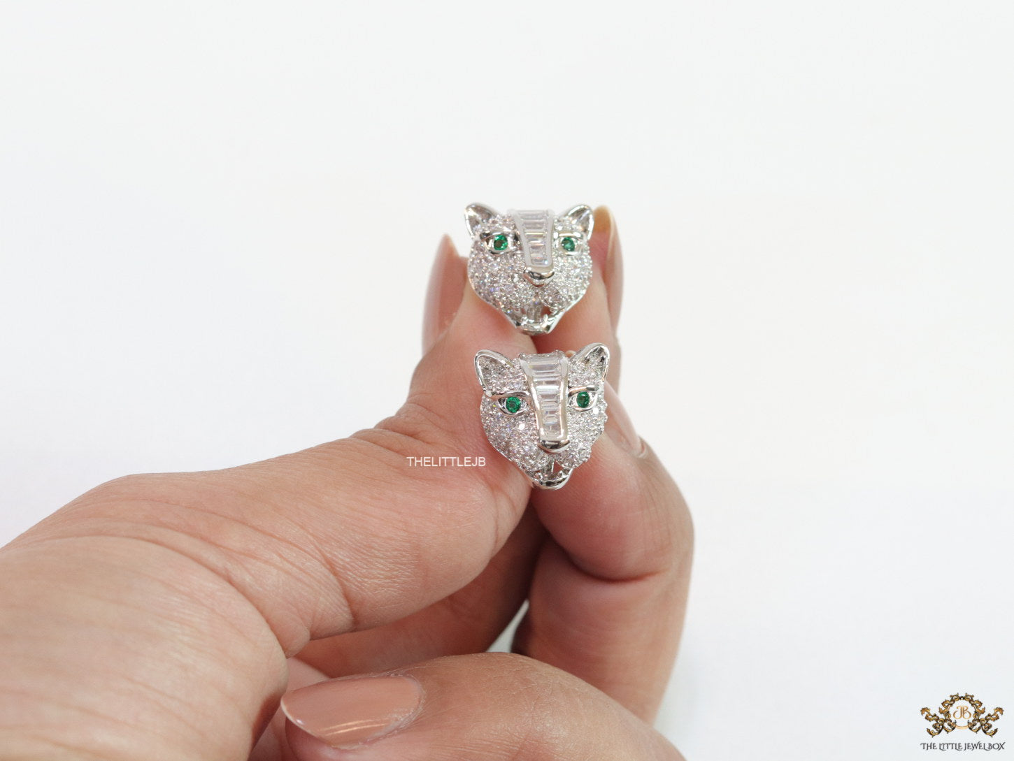 Cz panther stud earrings in platinum finish and emerald green eyes