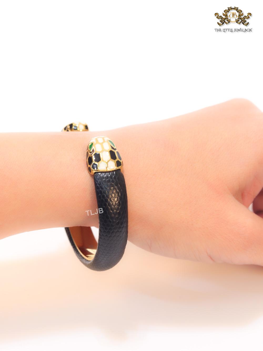 Two snake head black leather bracelet