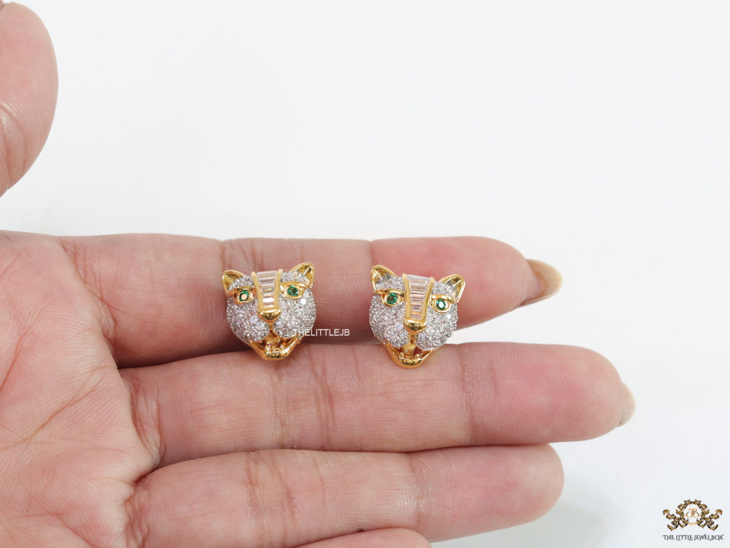 Cz panther stud earrings in gold finish and emerald green eyes