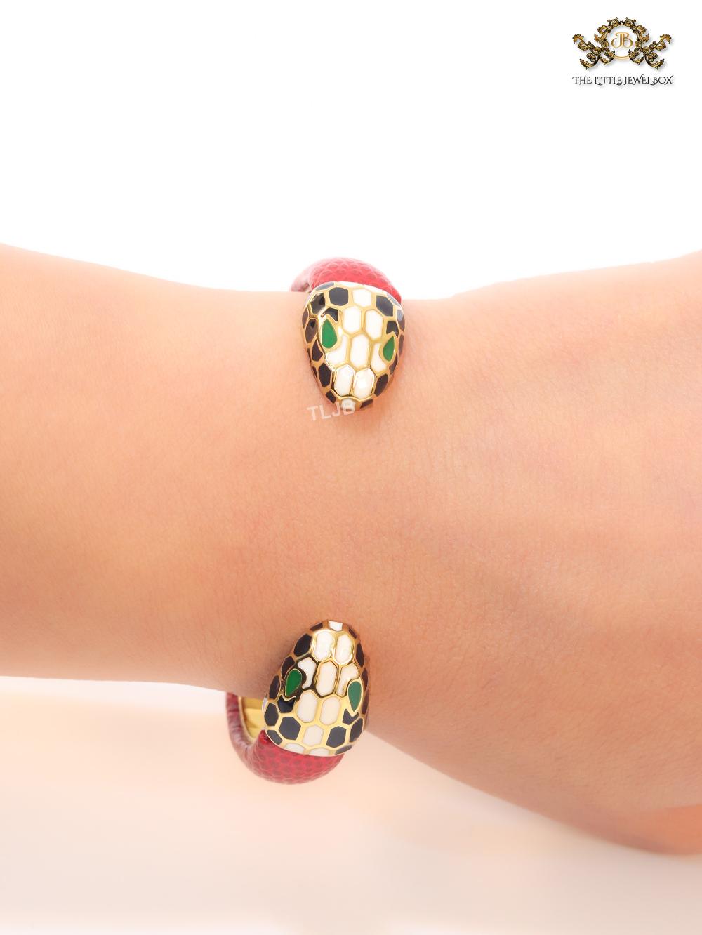 Two snake head red leather bracelet