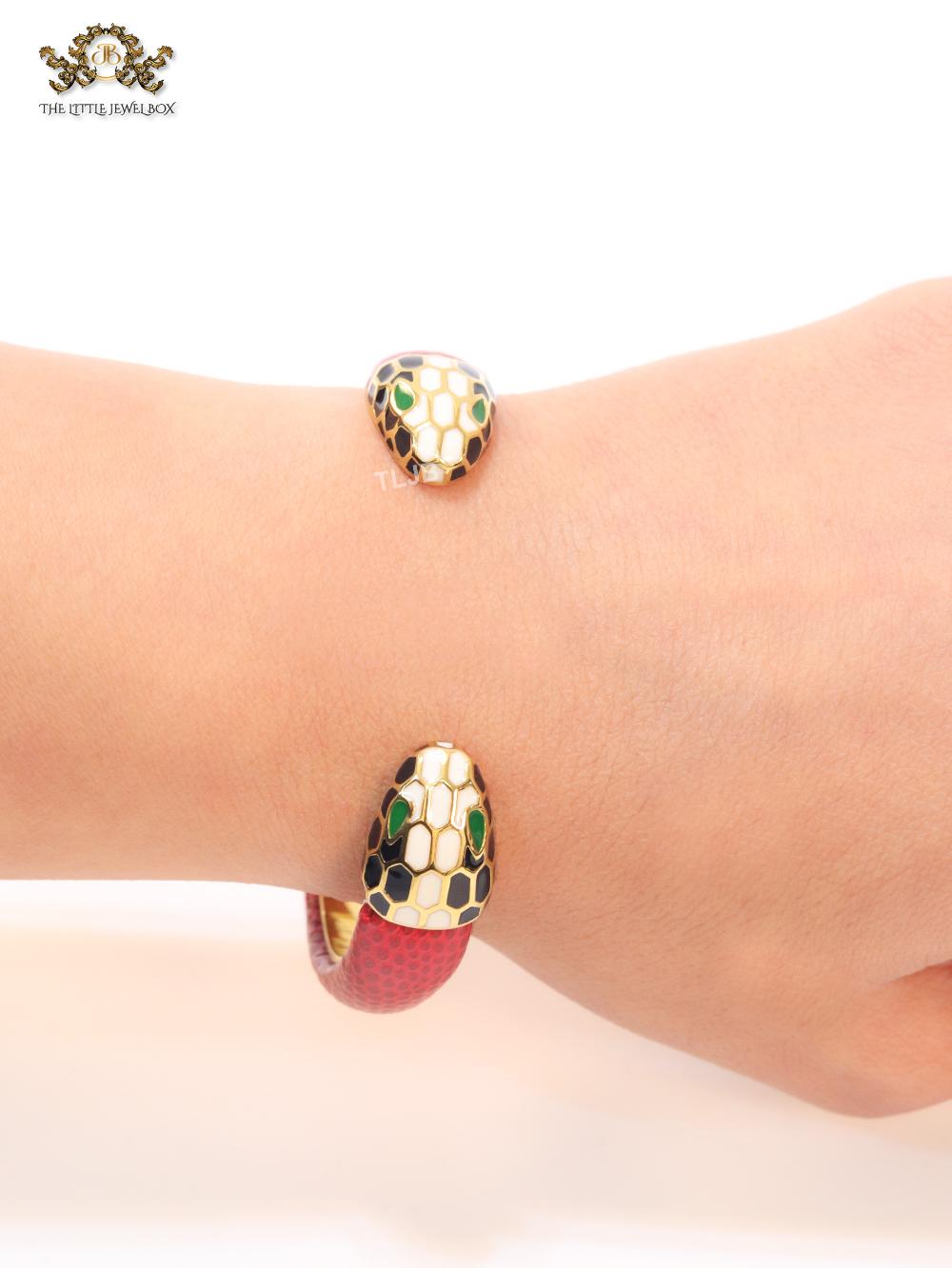 Two snake head red leather bracelet