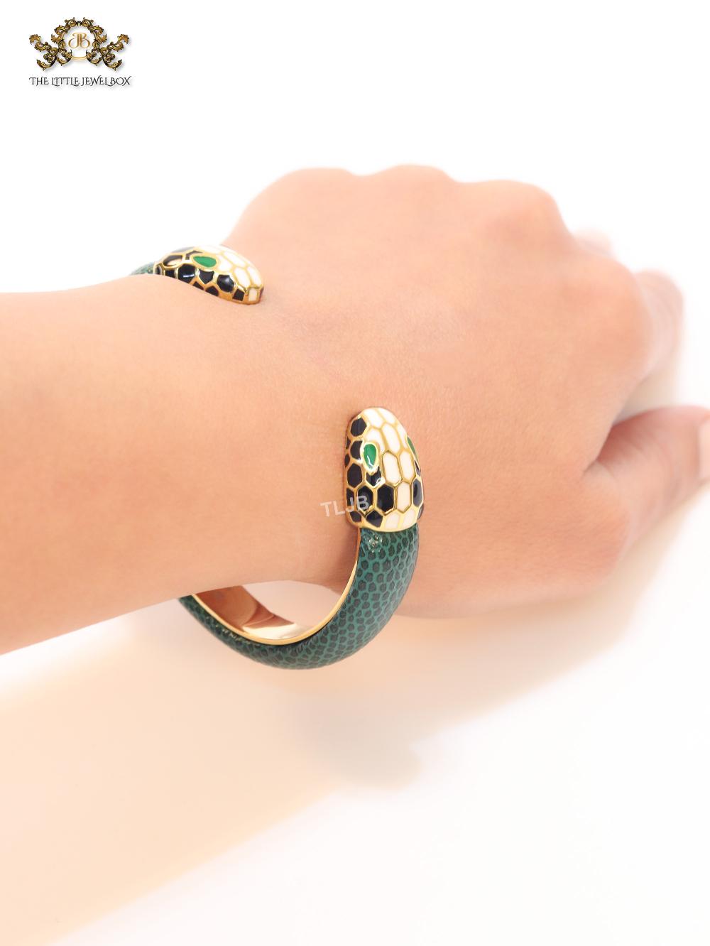 Two snake head green leather bracelet