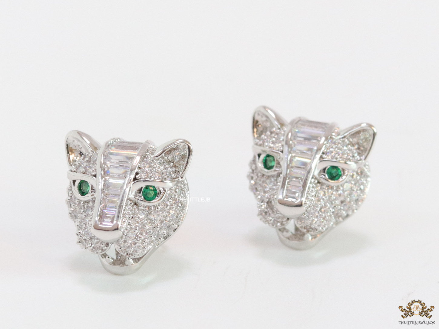 Cz panther stud earrings in platinum finish and emerald green eyes