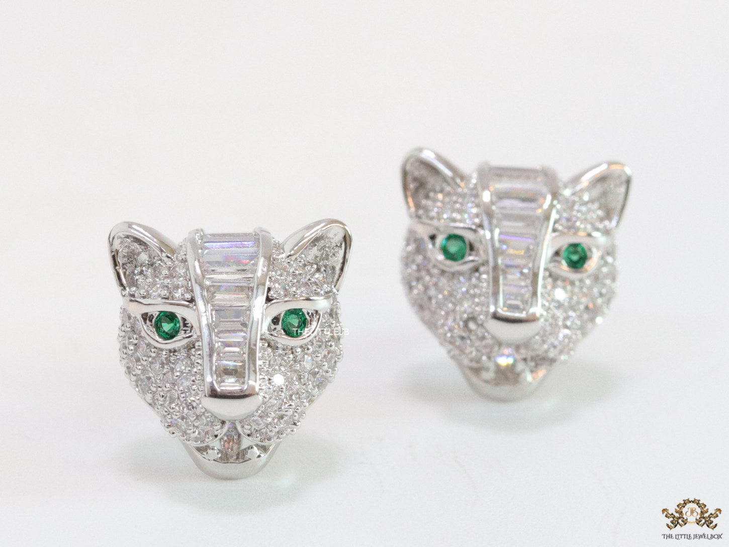 Cz panther stud earrings in platinum finish and emerald green eyes