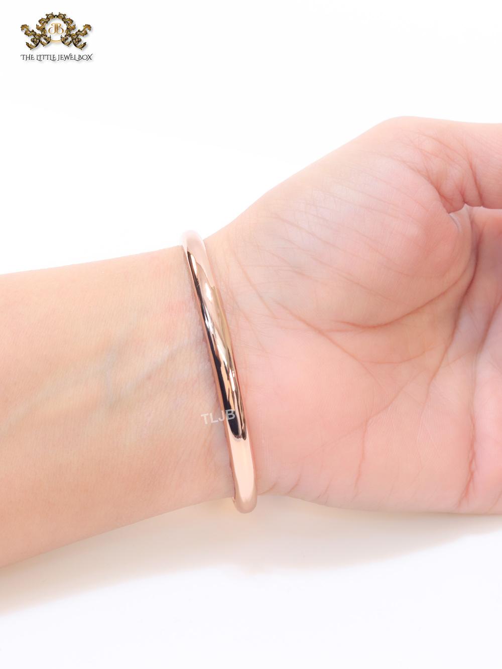 Alphabet CD rose gold and pearl bracelet