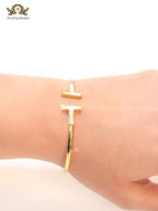 Alphabet T MOP and gold sleek bracelet