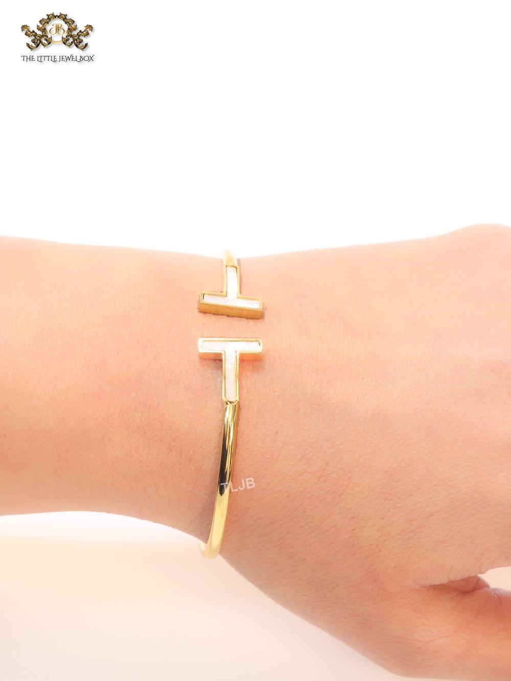Alphabet T MOP and gold sleek bracelet
