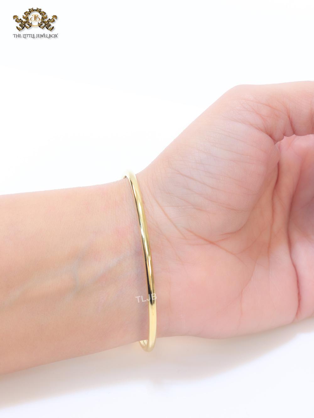 Alphabet T MOP and gold sleek bracelet