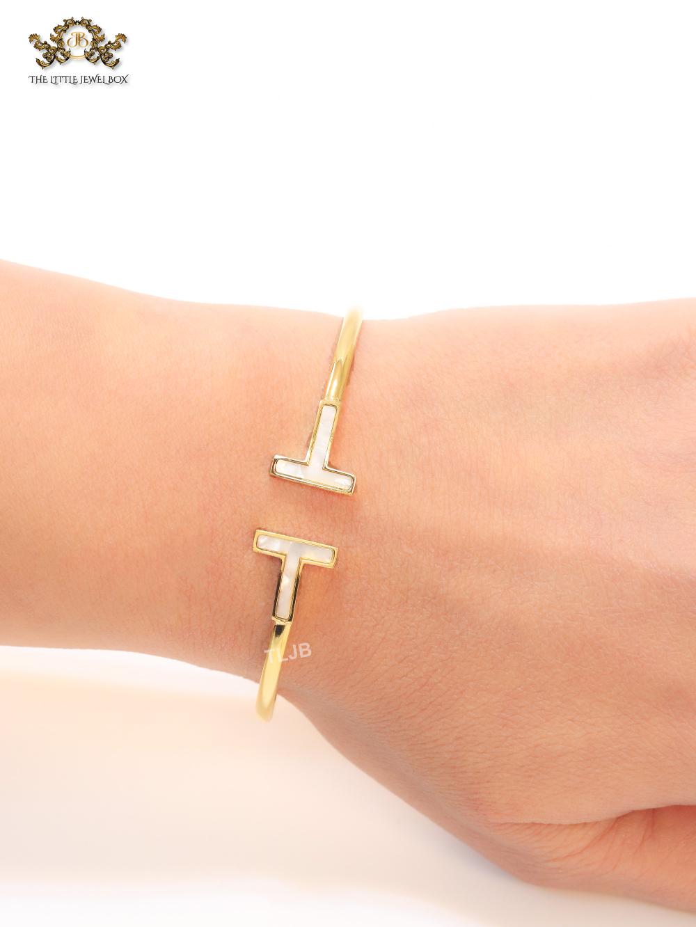 Alphabet T MOP and gold sleek bracelet
