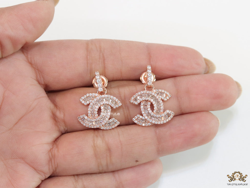Gold plated cz dangle earrings with twin C motif