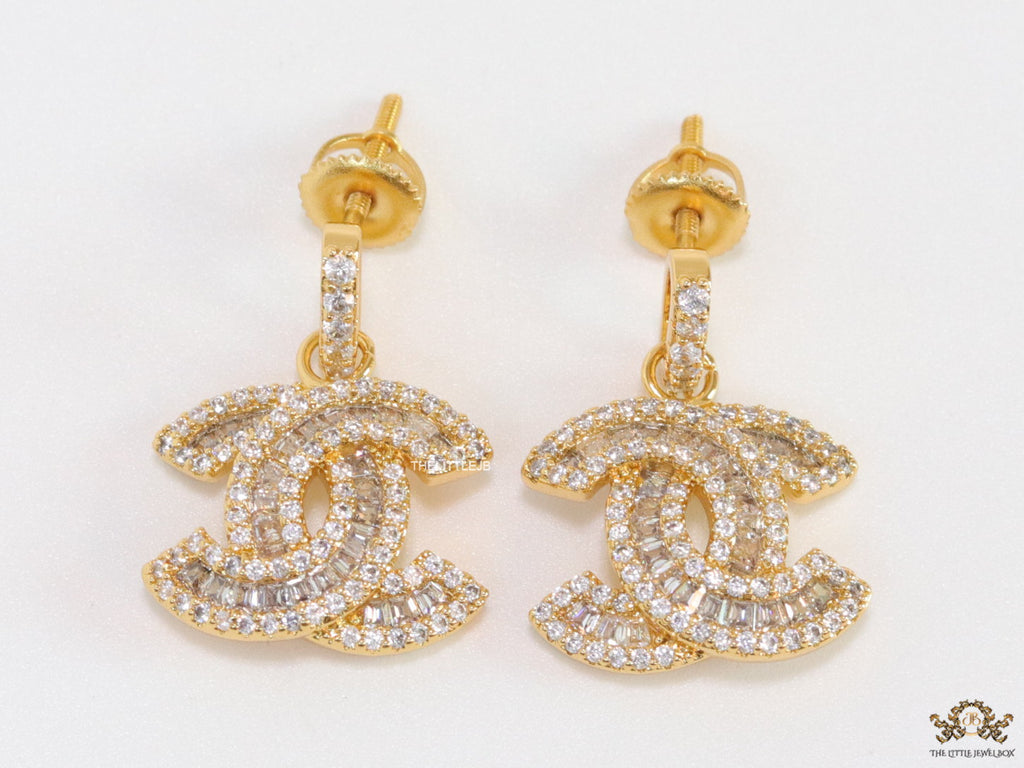 Gold plated cz dangle earrings with twin C motif