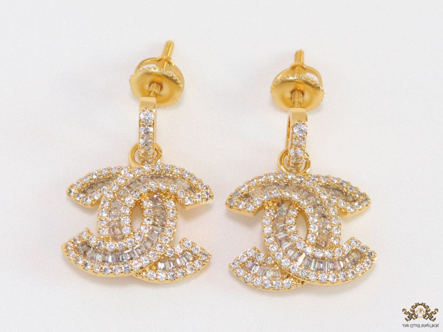 Gold plated cz dangle earrings with twin C motif