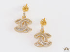 Gold plated cz dangle earrings with twin C motif