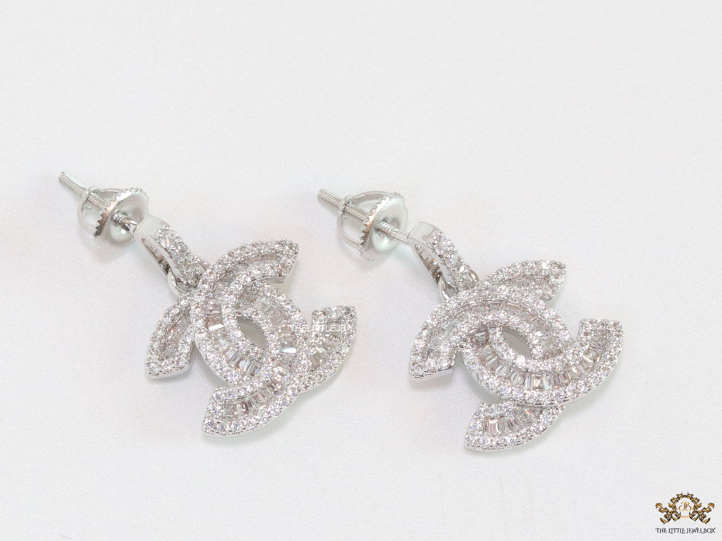 Platinum plated cz dangle earrings with twin C motif