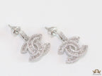 Platinum plated cz dangle earrings with twin C motif