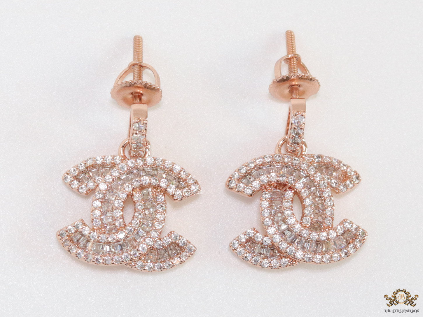 Rose gold plated cz dangle earrings with twin C motif