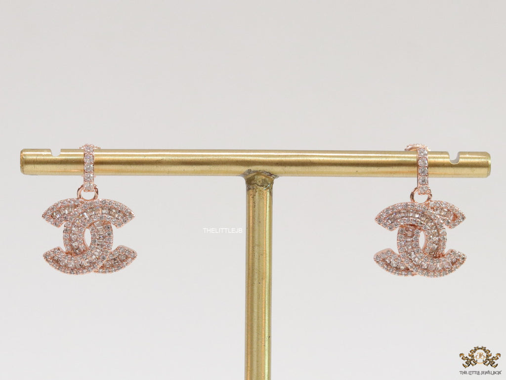 Rose gold plated cz dangle earrings with twin C motif