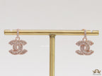 Rose gold plated cz dangle earrings with twin C motif