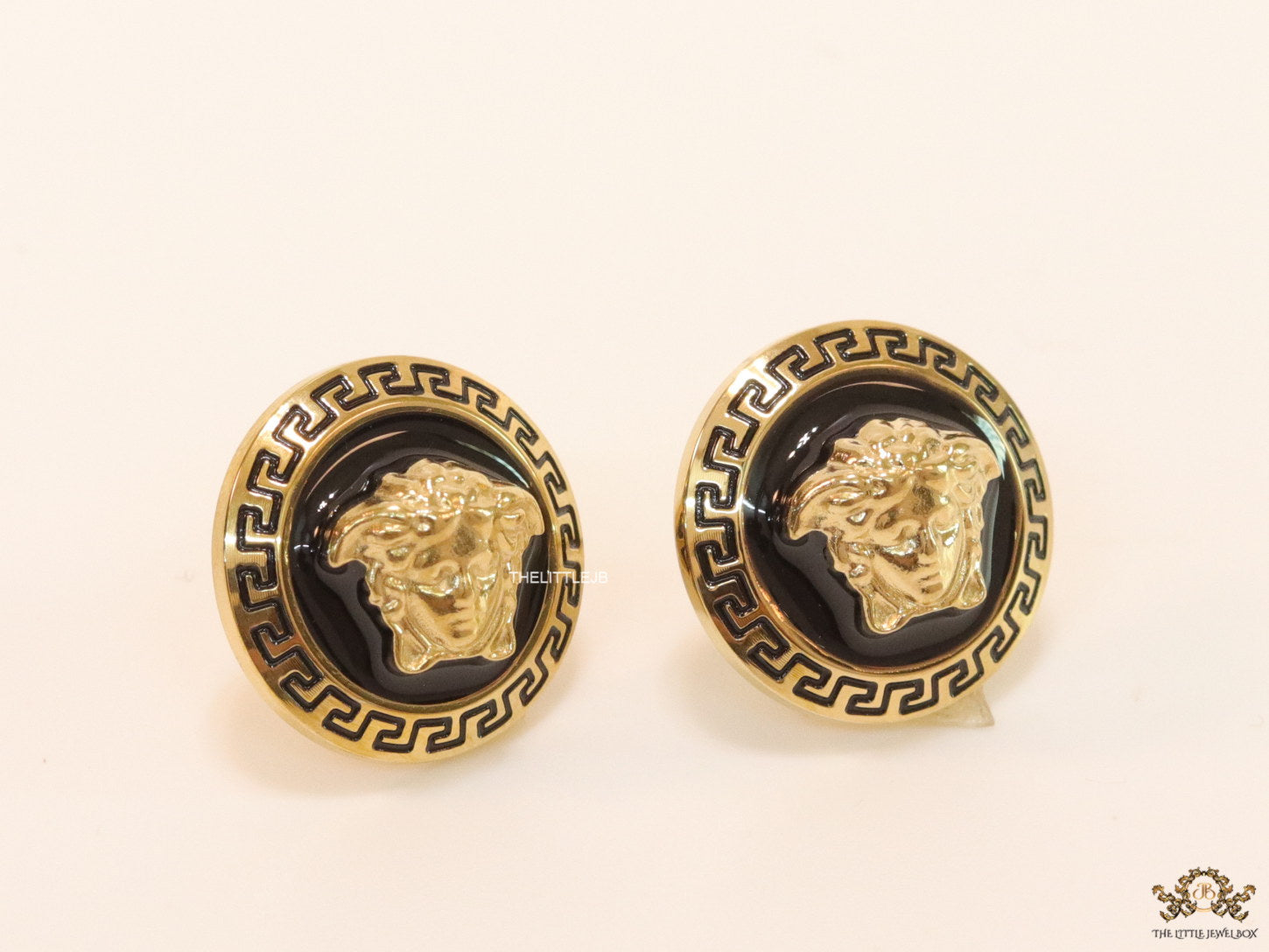 Antique Gold plated 3D Medusa motif on black base and golden details studs