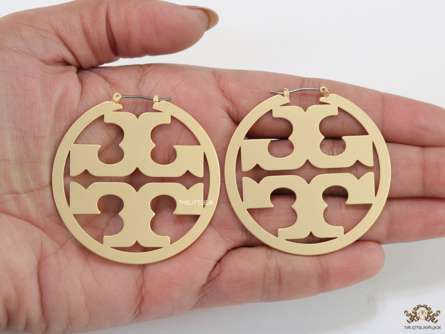 Matt Gold hoops with T motifs