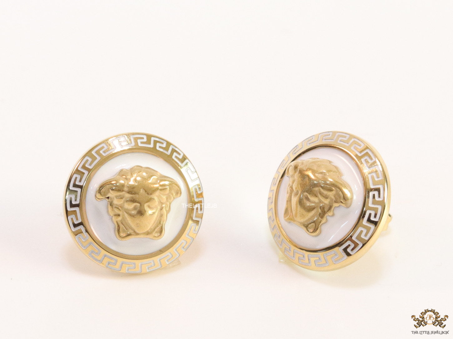 Golden 3D Medusa motif on white base and golden details studs