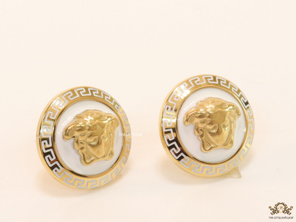 Golden 3D Medusa motif on white base and golden details studs