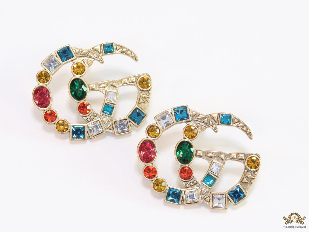 Double G golden earrings with multicolor cz stones