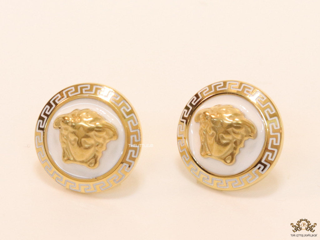 Golden 3D Medusa motif on white base and golden details studs