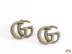 Antique gold plated double G motif studs with honey comb texture