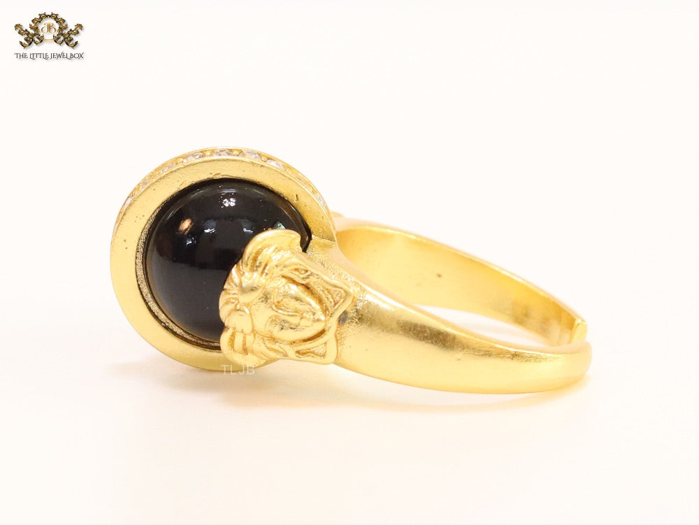 Double gold Medusa with CZ on black ball ring
