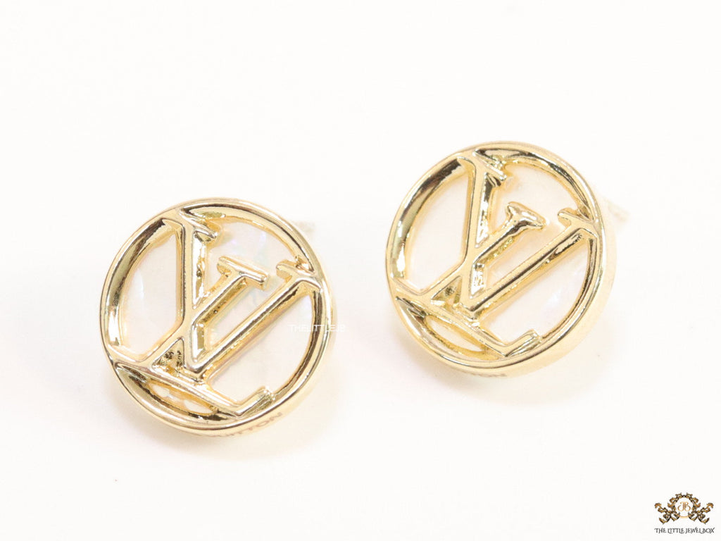 Gold plated alphabet motif studs in golden circular ring