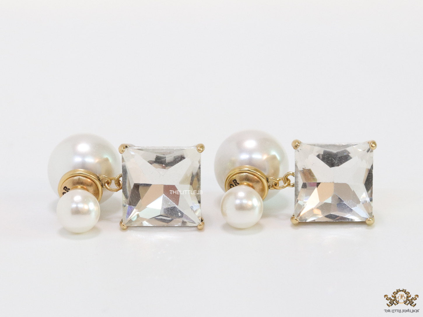 Pearl and cz drop earrings in golden finish with alphabets
