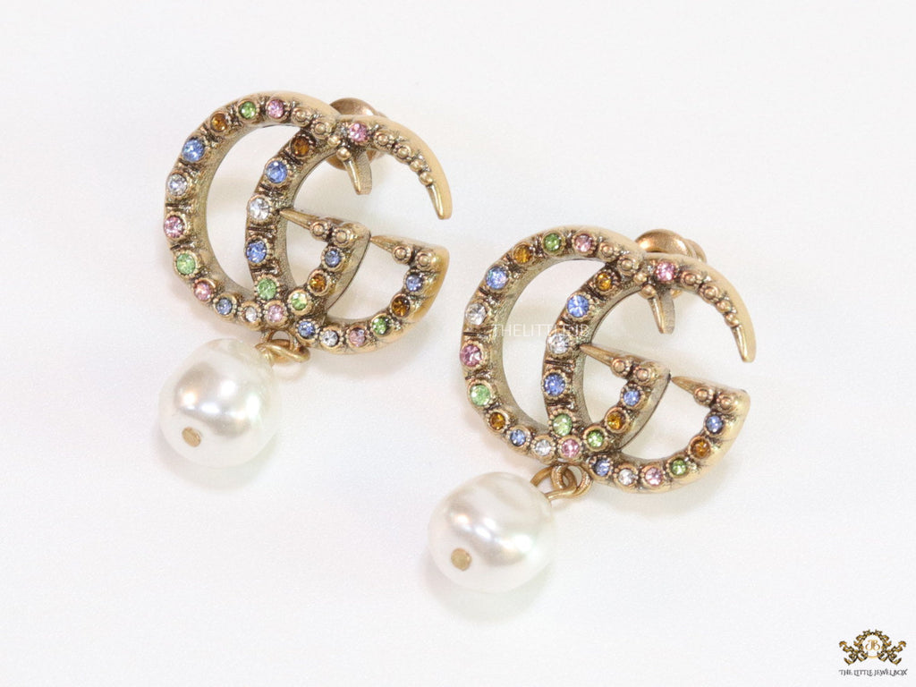 Double G golden earrings with multi color cz stones and pearl