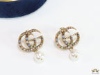 Double G golden earrings with multi color cz stones and pearl