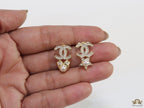 Gold plated double C earrings with pearl heart and star