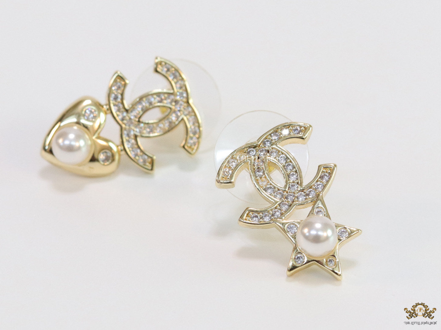 Gold plated double C earrings with pearl heart and star
