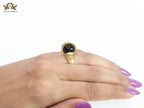 Double gold Medusa with CZ on black ball ring
