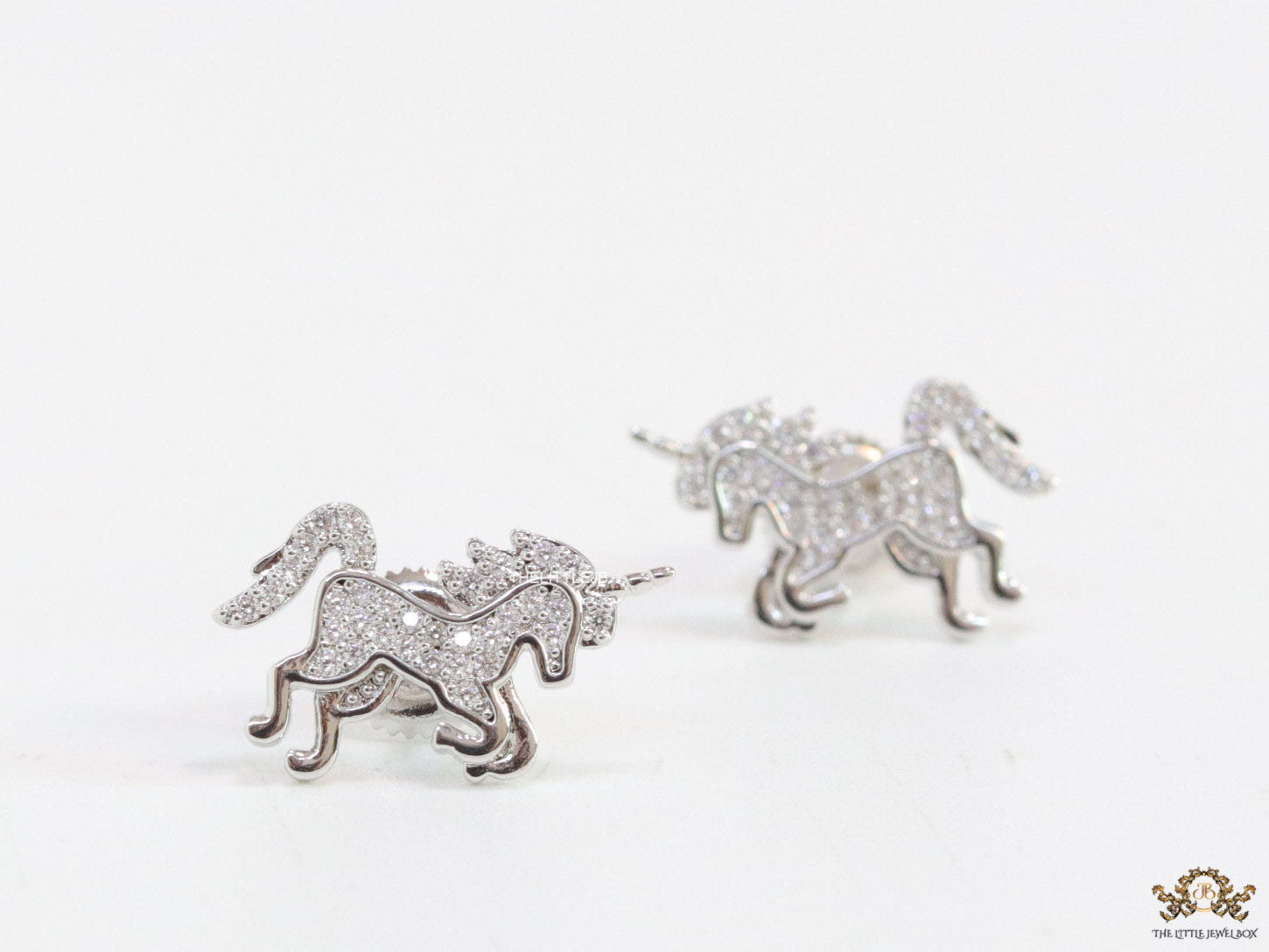 Unicorn cz stud earrings in platinum 15mm