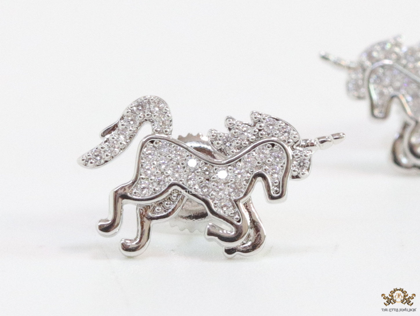 Unicorn cz stud earrings in platinum 15mm