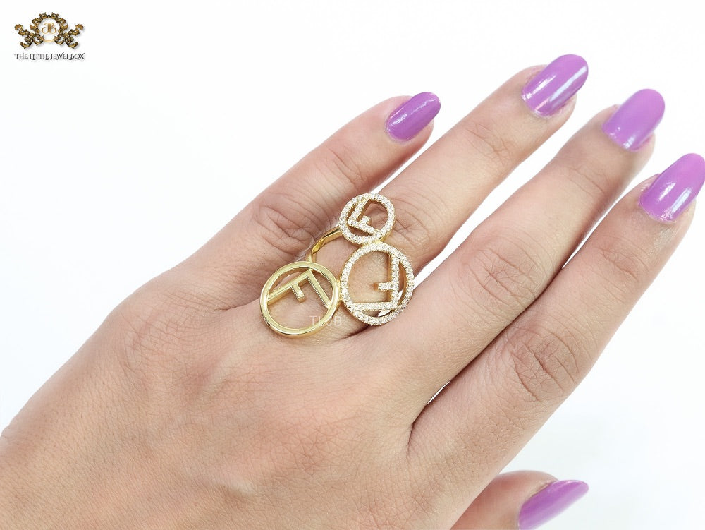 Triple F on a ring with CZ gold plated ring