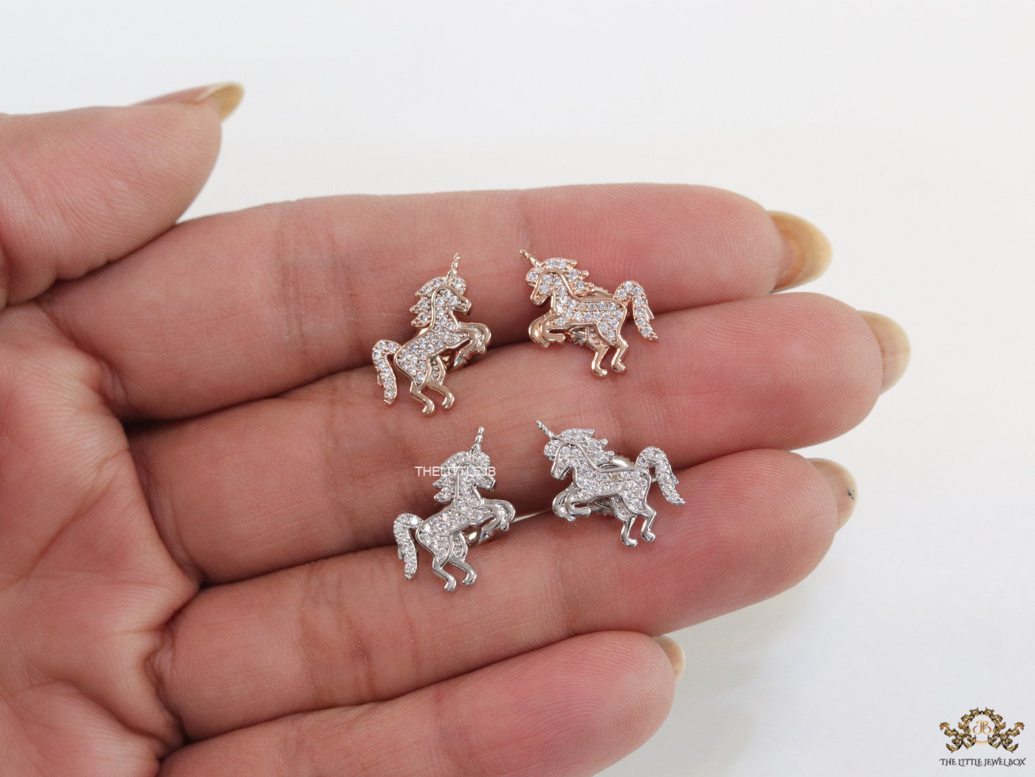 Unicorn cz stud earrings in platinum 15mm
