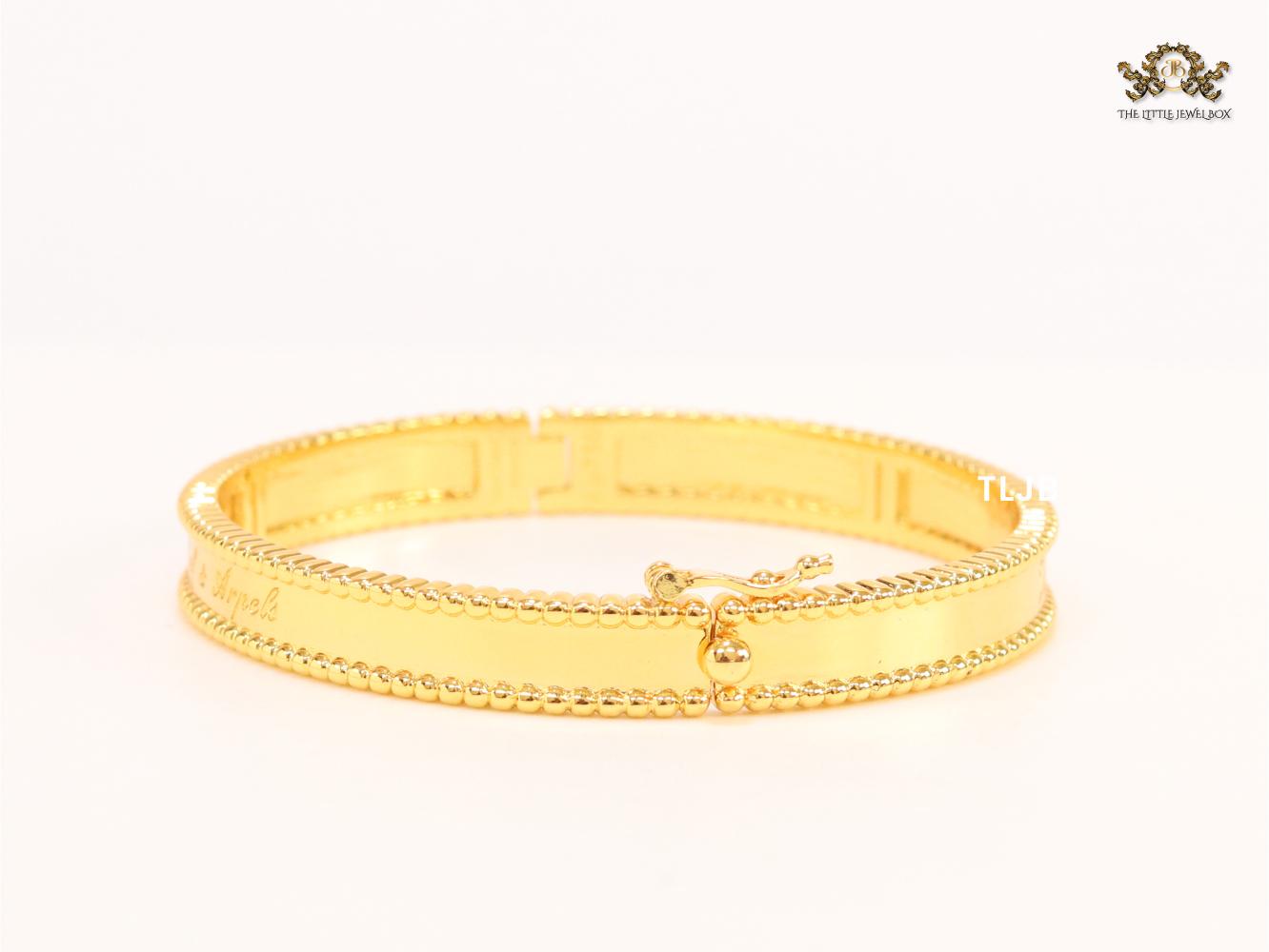 Sleek gold bracelet