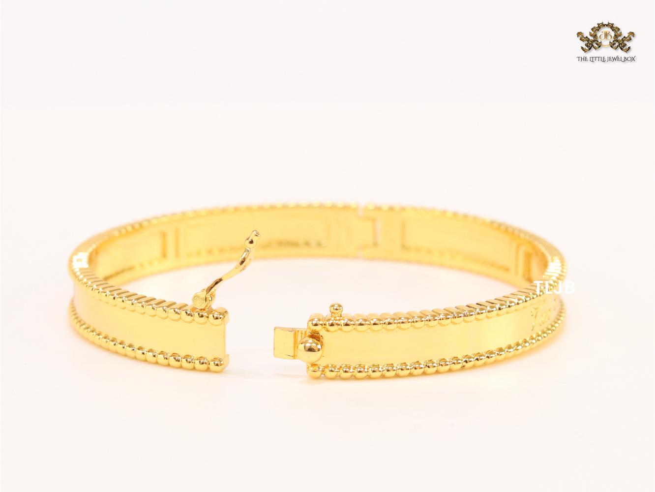 Sleek gold bracelet