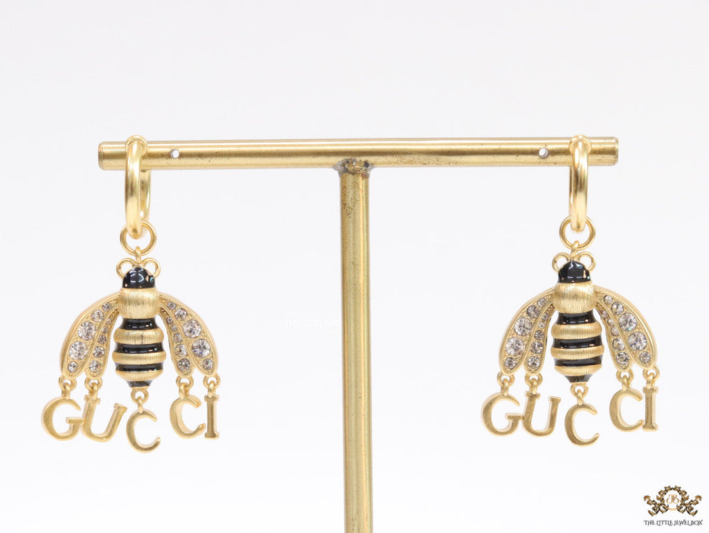 Simple gold plated hoops with golden and cubic zirconia stone queen bee and alphabets