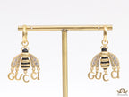 Simple gold plated hoops with golden and cubic zirconia stone queen bee and alphabets