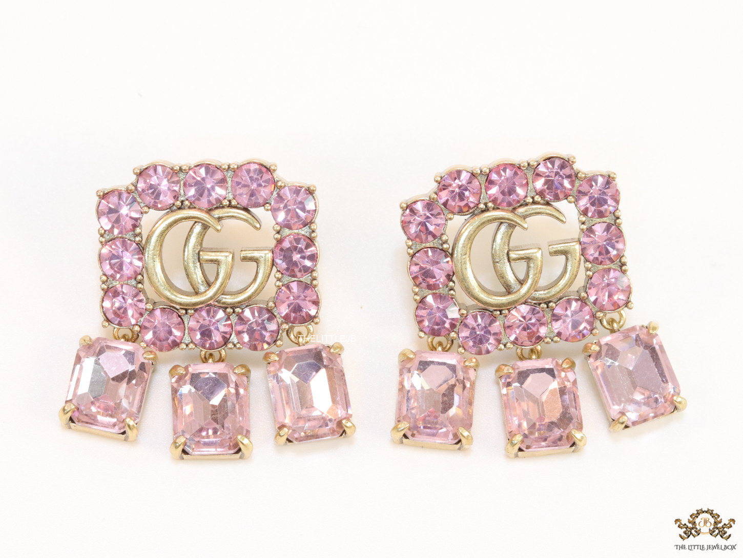 Lavender stone studes with gold plaetd double G motif and lavender stone drop